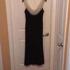 Black formal dress with cowl neck beaded detail